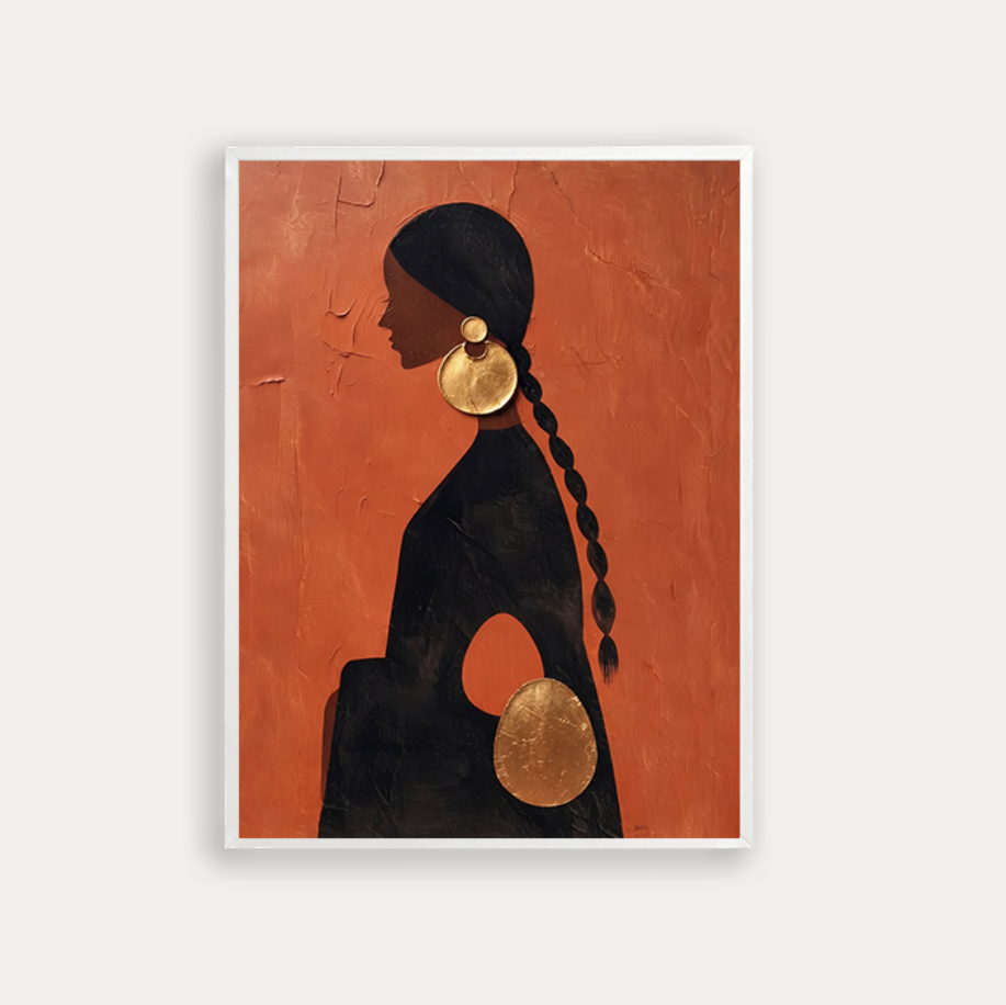A braided hair and large gold earrings