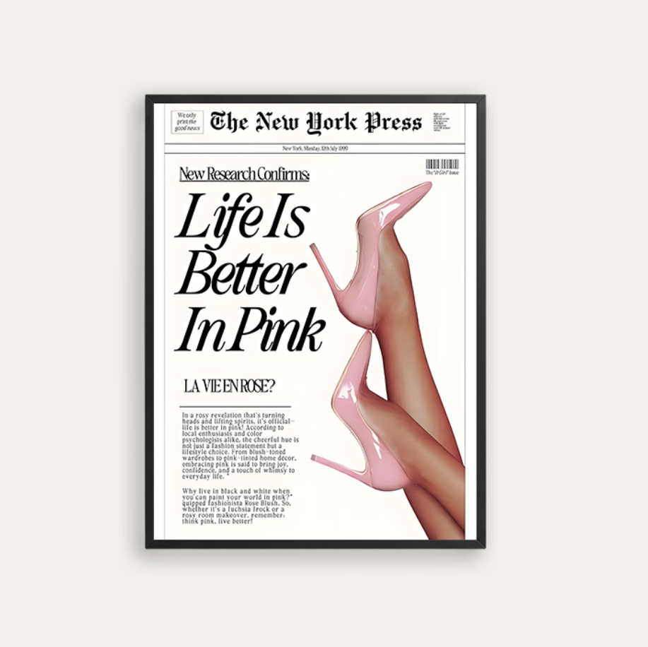 A framed art print styled like a vintage New York Press cover, featuring the headline 'Life Is Better In Pink' and a graphic of pink high heels on legs, shown against a light gray background.